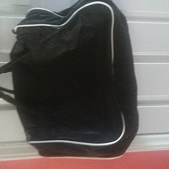 Addias duffle bag est 21x7x14$34 + Addias hat - Picture 3 of 7